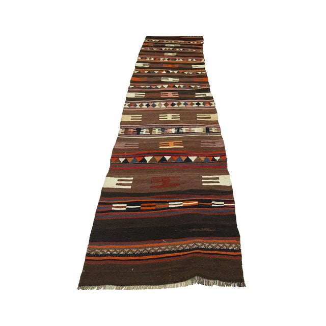 Vintage decorative handwoven kilim runner from South Eastern Turkey.Approximately 45-55 years old. In very good condition.