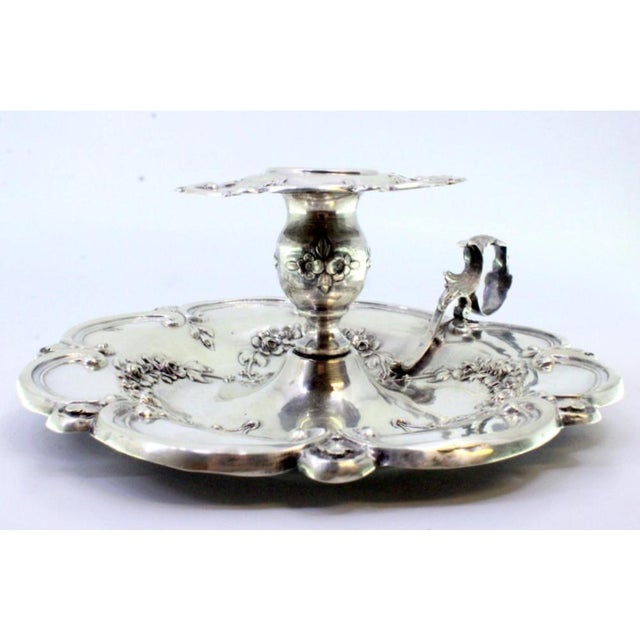 Silver Paddle with Raised Floral Motifs and Acanthus Leaf Applications, in Very Good conditions. Designed 1890 to 1919...