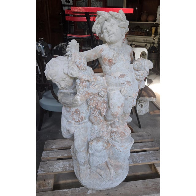 Large Garden Sculpture with Putti and Garlands in Reconstituted Stone, 1950s, in Good conditions. Designed 1950 to 1959