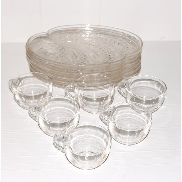 A beautiful complete service for six mid-century sip and serve hospitality snack set manufactured by the Federal Glass...