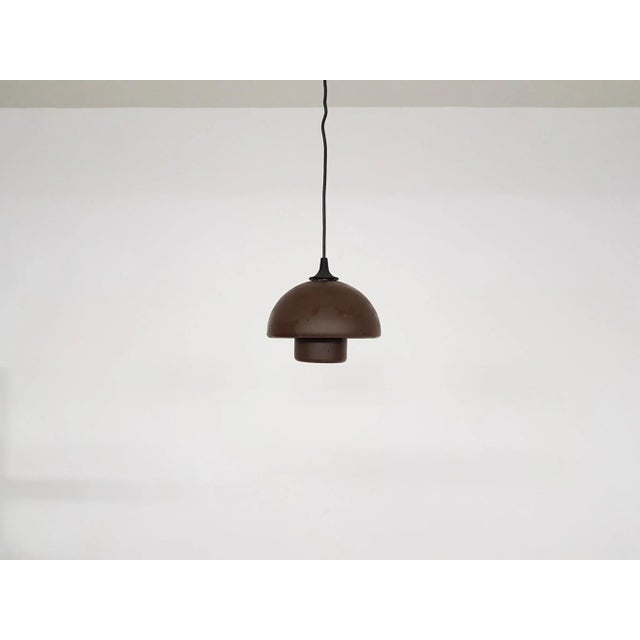 Raak ceiling lamp Verner Panton style. Some rust. This piece is designed in the style of the selected designer and/or...