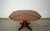 Original vintage Midcentury Modern dining table for sale. It's made of walnut with a black x design on the top, and has...