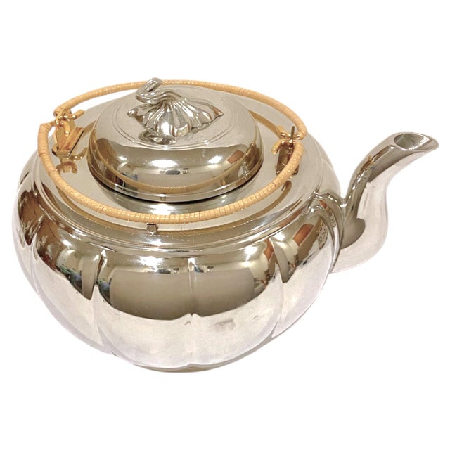 This is a stunning Royal Selangor pewter "Melon" teapot in the large size. The Melon teapot is an exact replica of Royal...