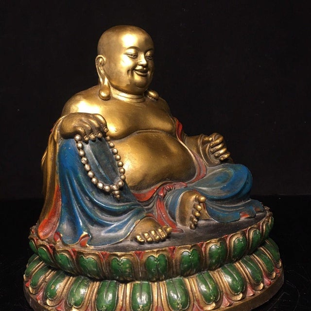This is a handcrafted solid brass laughing Maitreya Buddha statue, finished with gilding and rich hand-painted color...