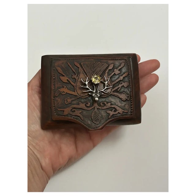 So rare is this small hand carved wooden trinket box. The box was carved in the Antebellum period with a shield on its...
