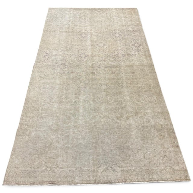 An antique Turkish Sivas rug with a delicate allover floral pattern and a beautifully softened neutral palette. Tiny,...