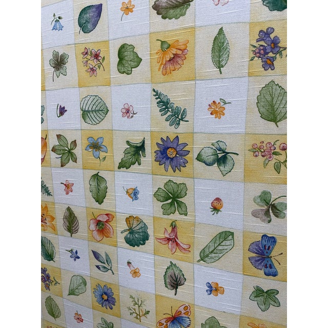 A reversible 3-panel folding screen upholstered in a cheerful floral motif pattern. This arched top folding screen is...