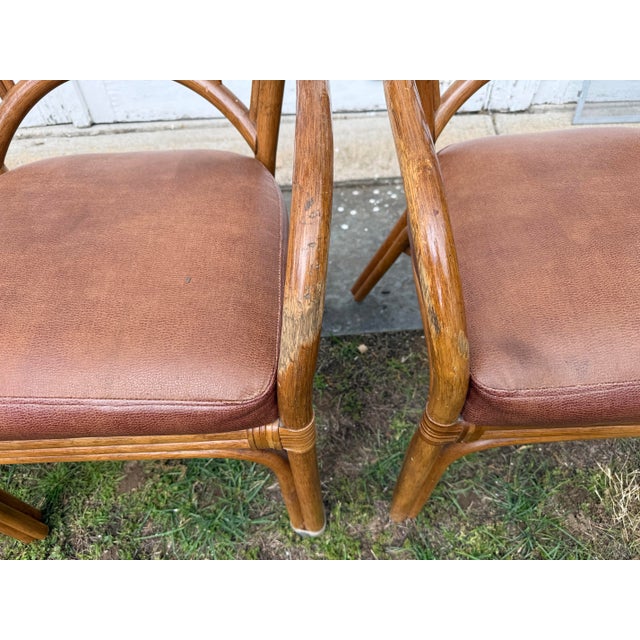 Mid Century Modern armchairs. Bentwood with textured brown Naugahyde cushioned seats.