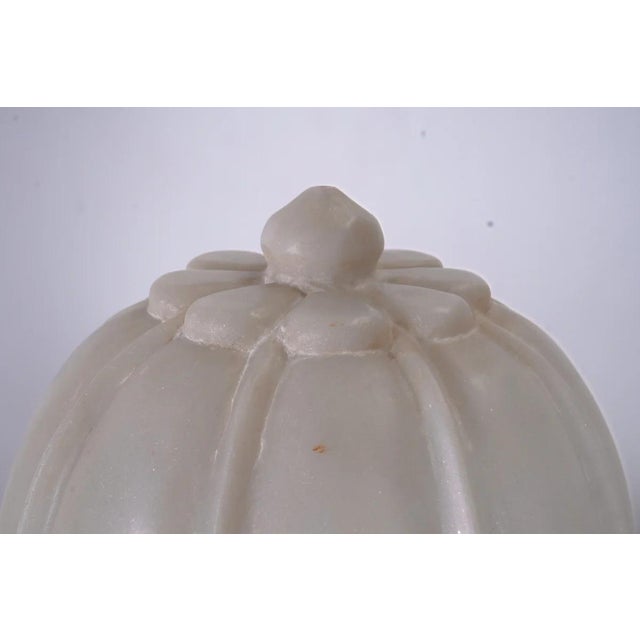 The Carved Agra Style Marble Bookends or Paperweights bring a sense of timeless craftsmanship and classical influence to...
