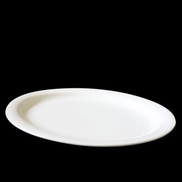 Vintage white large plate "Arctica" from Arabia Finland mid-century This piece has an attribution mark, I am...