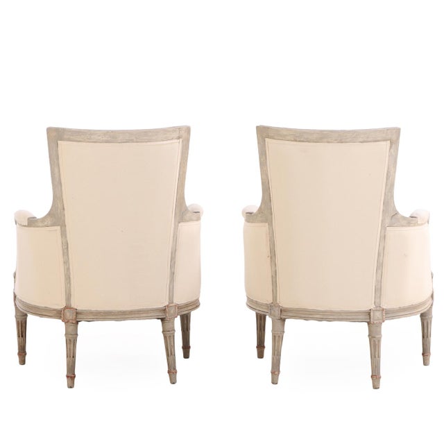 A Pair of Louis XVI Style Grey Painted and Partial Gilt Bergere Chairs, C. 1940. For Sale - Image 4 of 4