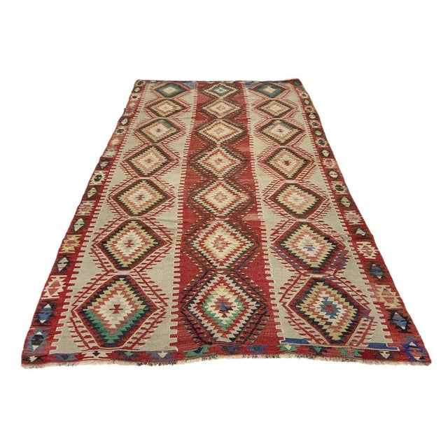 Handwoven vintage kilim rug from Denizli region of Turkey. Approximately 55-65 years old. In very good condition.