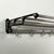 Vintage aluminum coat rack from the 1950s, featuring a distinctive industrial design. The lightweight yet sturdy frame is...