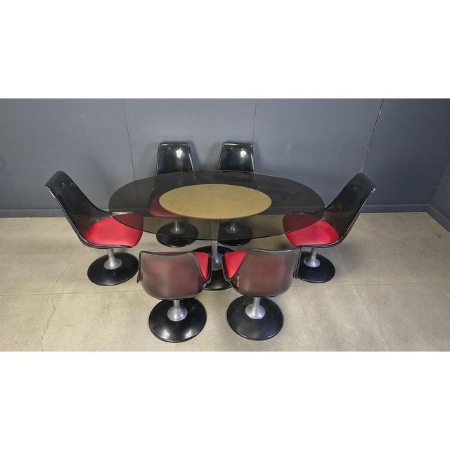 Space age tulip design dining set by Chromcraft manufactured in the USA. The set consists of 6 dining chairs with black...