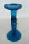 This charming glass candlestick holder has a great vintage style with a spindle / pillar silhouette and a lovely blue...