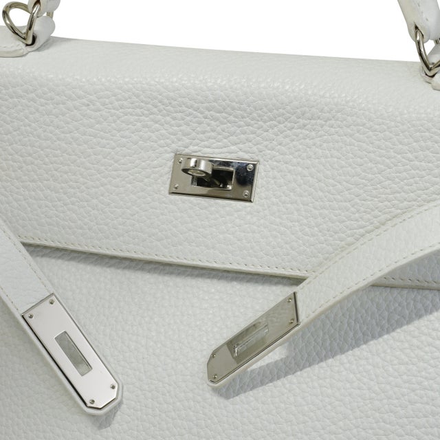 White is the hardest colour to keep on a bag and the most direct evidence of how one has been kept. Nothing hides on a...