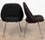 A pair of 1970s armless Executive Chairs Attributed to Saarinen and made by Knoll. The chairs have the original black...