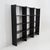 A modular black metal bookcase with a strong minimalist and industrial character, produced in the 1970s with a clean and...