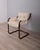 Brown tubular metal armchair with striped fabric upholstery, Scandinavian design, 1970s.