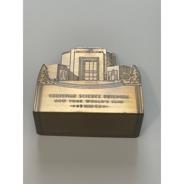 Pair of 1939 New York Worlds Fair etched brass art deco bookends. Measure about 5” wide X 4” tall