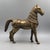 This impressive vintage horse statue made of solid brass is a handcrafted work of art that impresses with both its...