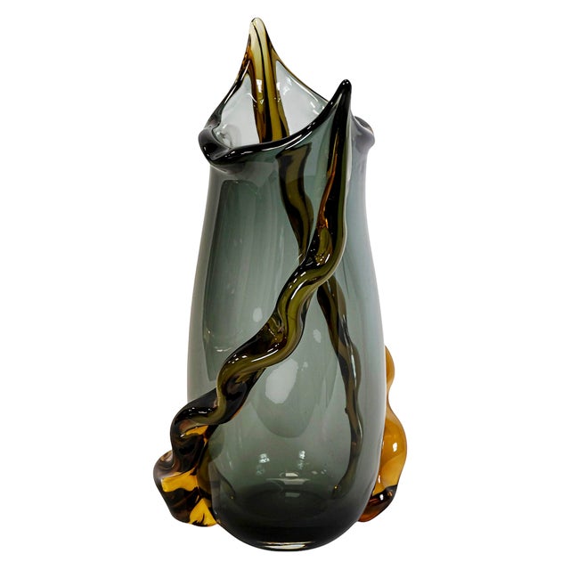 Large size vintage Italian handmade vase created in twisted form Murano glass. The glass is in grey color with ambra color...