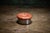 Francois Monnet Round Ottoman with bright orange leather tufted top and brushed metal base offers a distinctive modern...