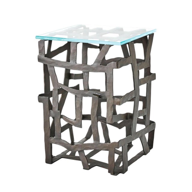 New in box Global Views Studio A Home Fragments End Table in blackened iron with tempered glass top. This sculptural...