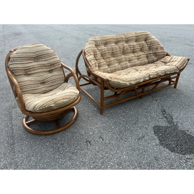 Structurally solid vintage bamboo rattan sofa This comes with brown and tan striped comfortable cushion (May need...