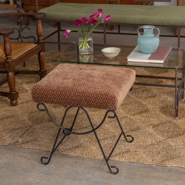 Beautiful iron stool with curved and looped base painted in a matte black finish inspired by French design. Rectangular...