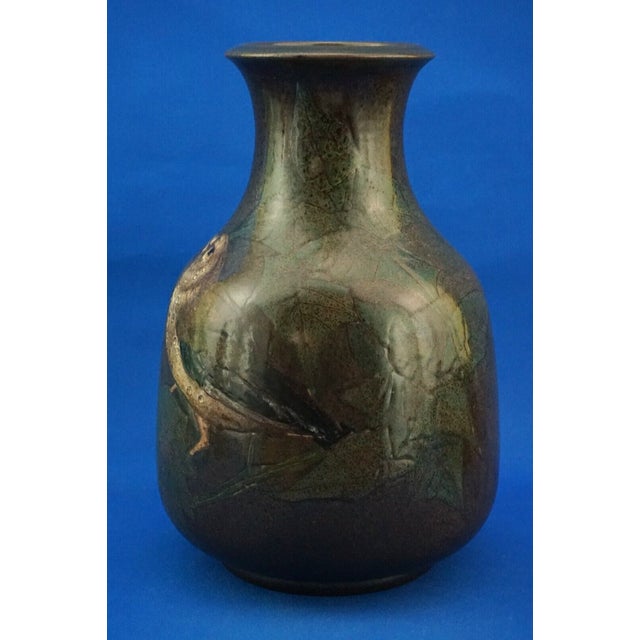 Fabulous vitrified majolica vase, entirely hand-crafted on a lathe, glazed, and decorated by hand, with foliage in light...