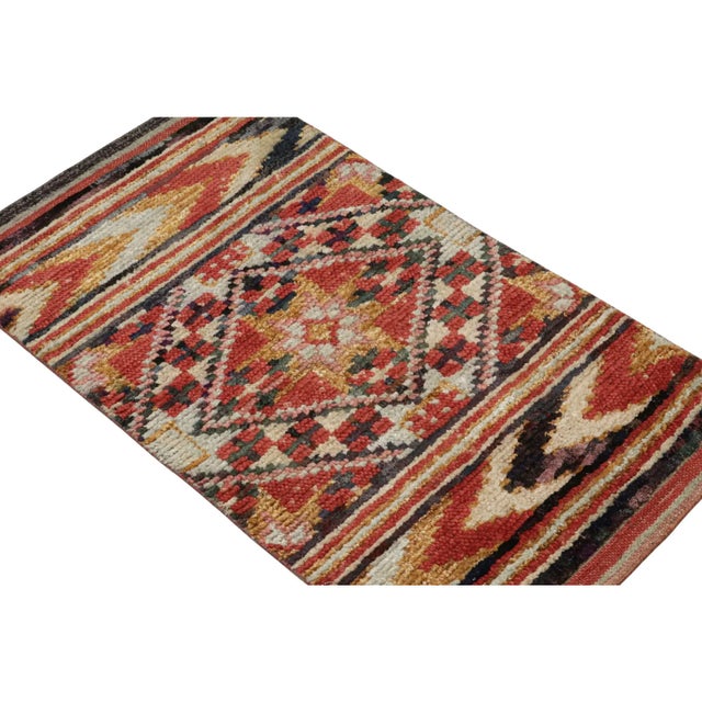 Hand-knotted in wool and silk, this 2x4 Moroccan rug features geometric patterns inspired by primitivist Berber weaving...