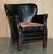 Lovely pair of Andrew Martin Halo Little Professor black leather armchairs with reversible Kilim upholstered seat cushion....