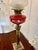 Antique Victorian Brass Oil Lamp with Cranberry Glass Font and Corinthian Column, 1860 For Sale - Image 4 of 8