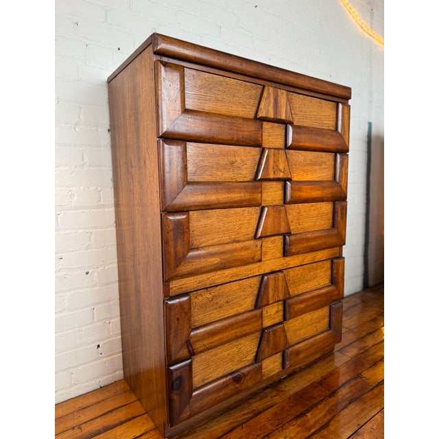 Tall MCM chest of drawers produced by Lane Furniture in the 1960s/70s. Contstructed of oak, this piece features 5 drawers...