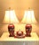 This spectacular pair of vintage Wescal Lamp Company chinoiserie porcelain ginger jar table lamps brings a grand,...