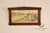 Charming framed print after Belgian artist Henri Cassiers, depicting a pastoral Dutch village scene with traditionally...