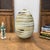 "About This Piece About This Piece Bring movement and warmth into your space with this striking ceramic vase, a piece that...