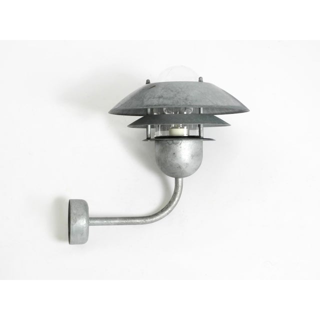 Beautiful nordlux outdoor lamp made of galvanized steel with one glass shade. manufactured in the late 1990s. This model...