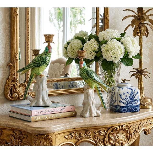 A breathtaking marriage of vibrant exoticism and Old World opulence, this magnificent pair of green porcelain parrot...