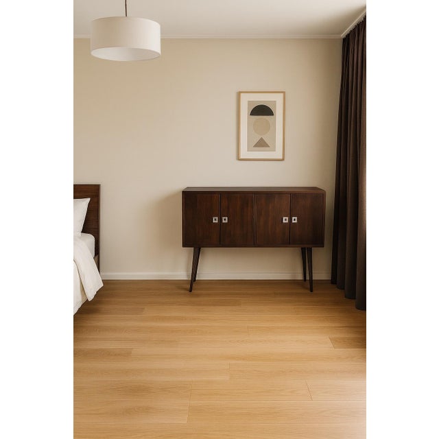 Both functional and beautifully sculpted, this sideboard is a statement piece that elevates your room with effortless...