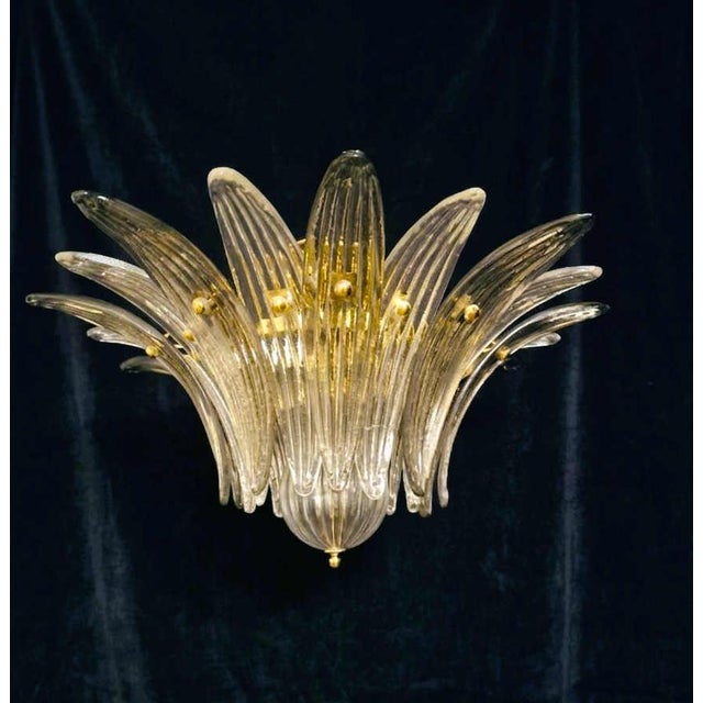 Italian flush mount shown in clear and smoky Murano palmette glass leaves, mounted on gold finish metal frame / Made in...