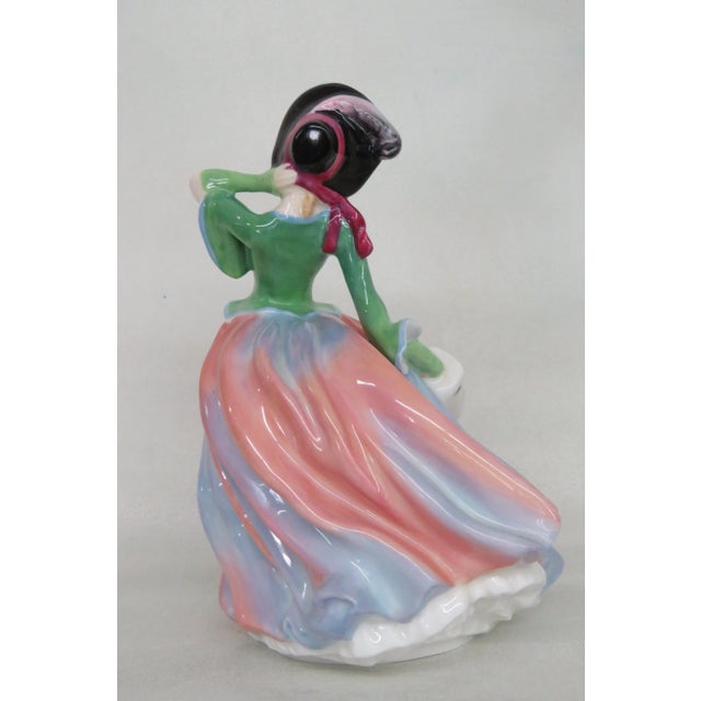 This adorable Figurine is made out of bone china / porcelain. This lovely little piece was made by Royal Doulton in 1939...