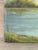 A charming, small vintage original landscape oil painting on canvas, signed lower left. This serene lakeside scene...