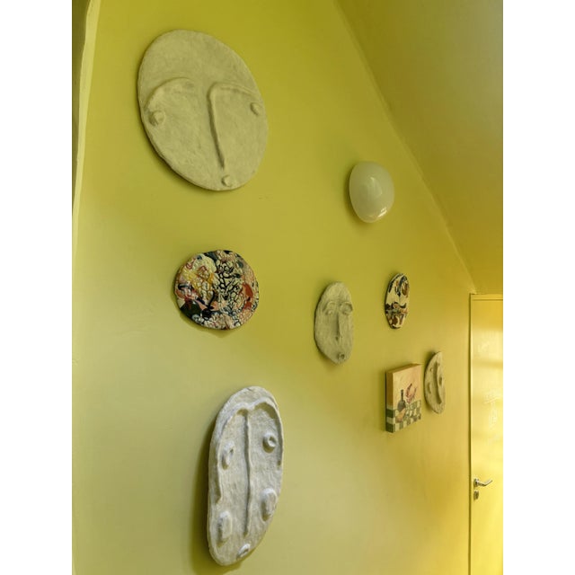 Sculptural mask made with papier-mâchè and acrylic paint by Mallorca-based Artist Anna-Alexandra. Anna’s work is inspired...