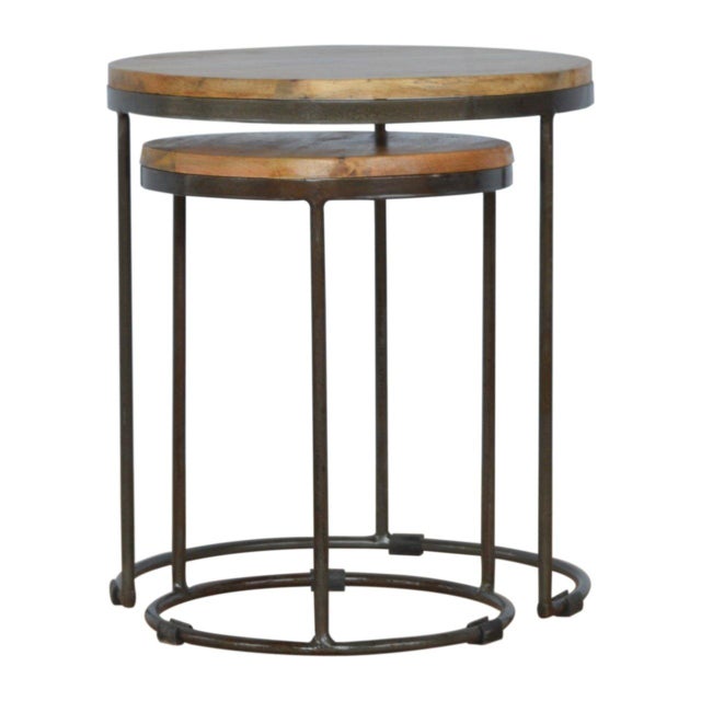 This set of two round nesting stools combines industrial edge with natural charm. The tops are crafted from solid mango...