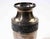 Elegant silver-plated urn-form vase featuring a refined neoclassical silhouette with a gently flared rim, baluster neck,...