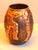 An ovoid vase in copperware by Jean Goardère, signed in relief under the neck, decorated with drips giving it a glossy...