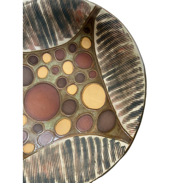 a signed vintage 1970s Mid Century Modern large ceramic studio art pottery bowl from Ecuador this beautiful round shaped...