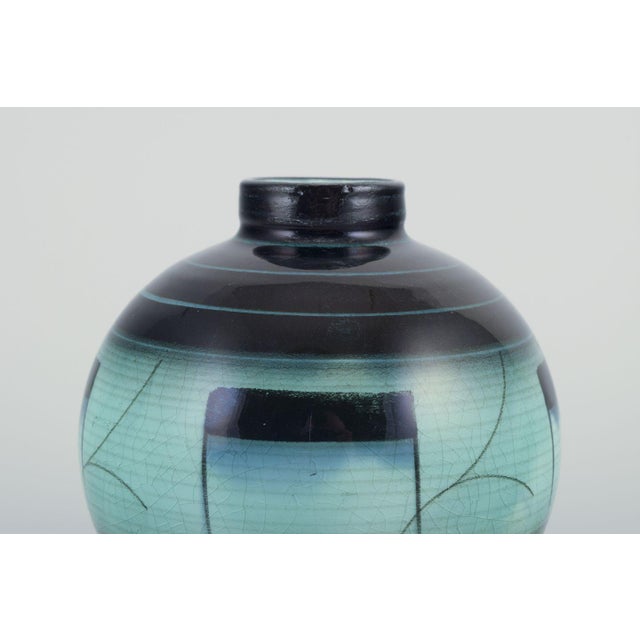Ilse Claesson for Rörstrand, Sweden. Vase in glazed faience. Art Deco style with geometric decoration. Hand-painted....